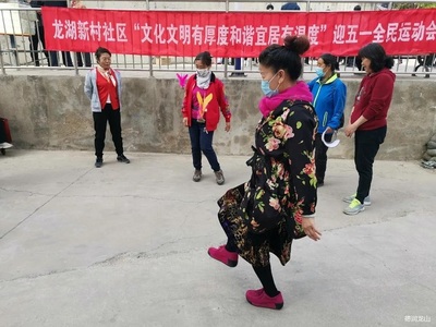 文明实践助力社区治理 龙山街道志愿服务破解电动自行车修理难题